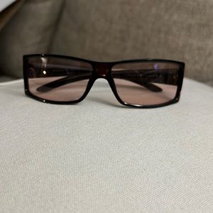 Used Gucci sunglasses. Brown frame with pinkish/rose tinted lenses